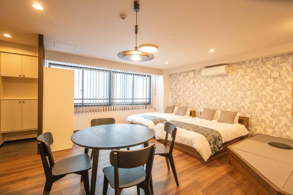 Appartement 浅草禅心居201室 浅草駅徒歩15分 2024年4月ニューオープン 43平米丸貸し切り ダブルベット2台と畳敷き布団2組 家庭式用品設備完備 *