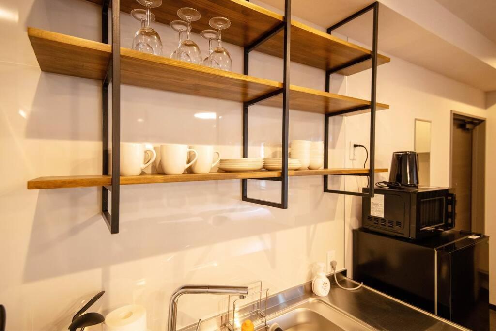 Appartement 浅草禅心居201室 浅草駅徒歩15分 2024年4月ニューオープン 43平米丸貸し切り ダブルベット2台と畳敷き布団2組 家庭式用品設備完備 *