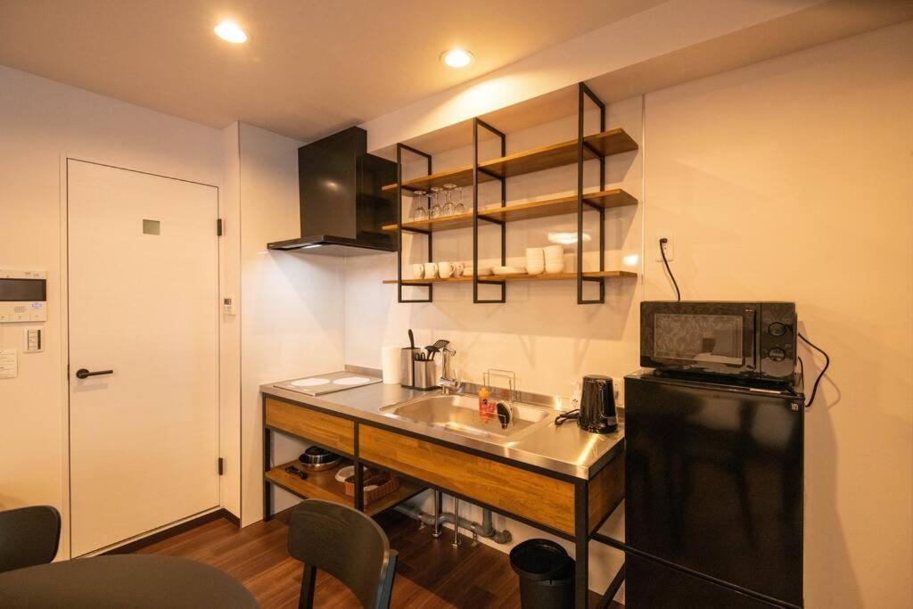 Appartement 浅草禅心居201室 浅草駅徒歩15分 2024年4月ニューオープン 43平米丸貸し切り ダブルベット2台と畳敷き布団2組 家庭式用品設備完備 *