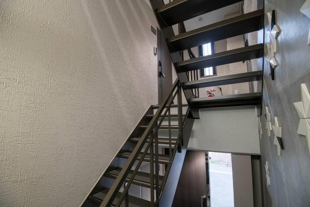 Appartement 浅草禅心居201室 浅草駅徒歩15分 2024年4月ニューオープン 43平米丸貸し切り ダブルベット2台と畳敷き布団2組 家庭式用品設備完備 *